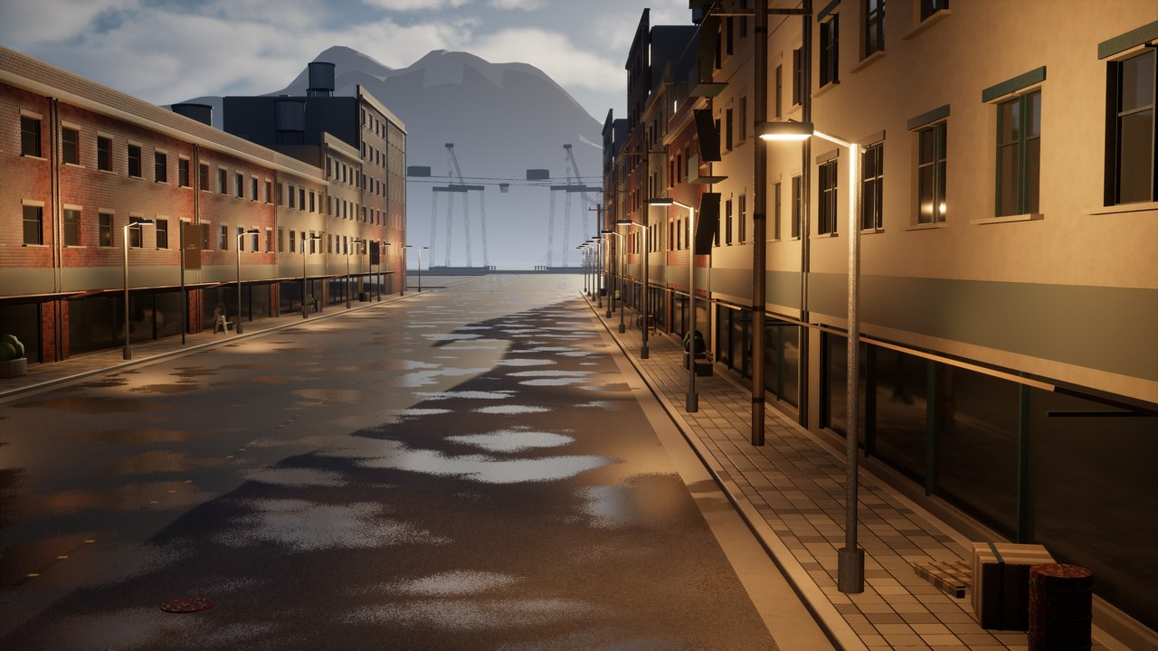 Warm street lamps reflect on Harbour Street, with port cranes and a mountain ridge ahead.